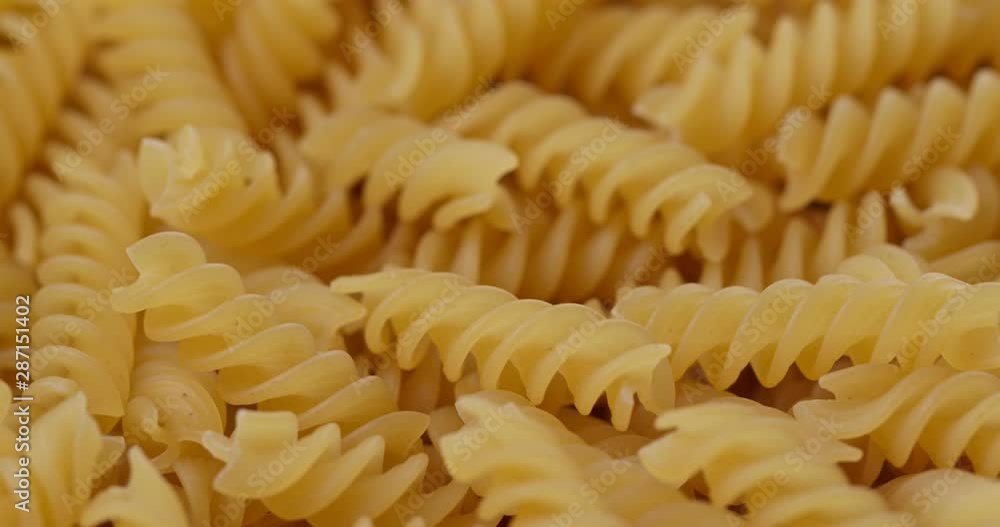 Dry uncooked fusilli close up Dry uncooked fusilli close up