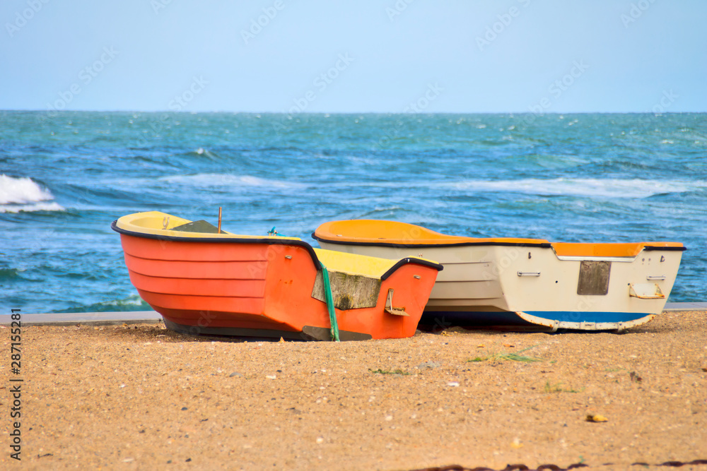Two boats on the beach