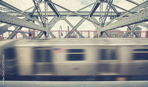 Sticker Williamsburg Bridge with subway train in motion, retro color toned picture,  New York City, USA
