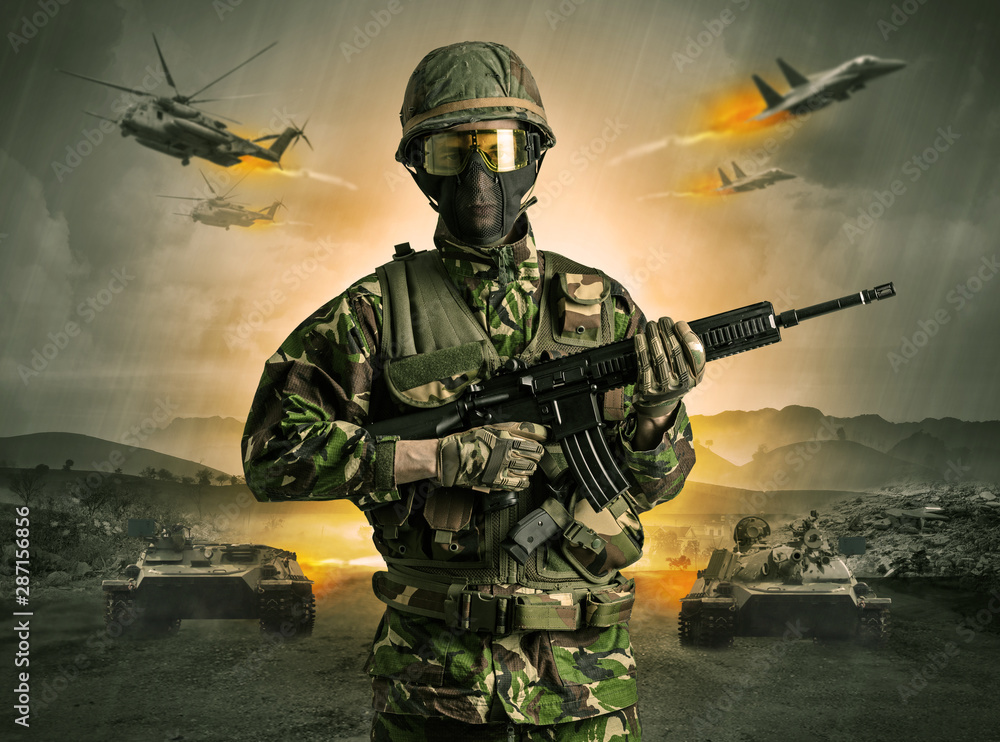 Armed soldier with sniper in the middle of a war Armed soldier with sniper in the middle of a war