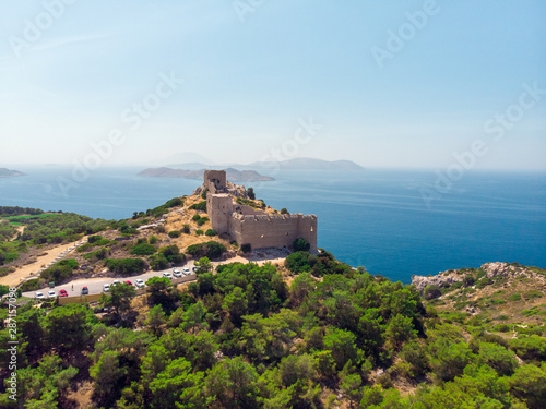 Photo of ancient fortress, sea, blue sky, mountain fortress
