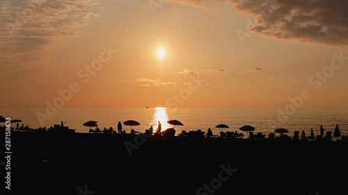 Sunset landscape. beach sunset. palm trees silhouette on sunset tropical beach, Summer © brillianata