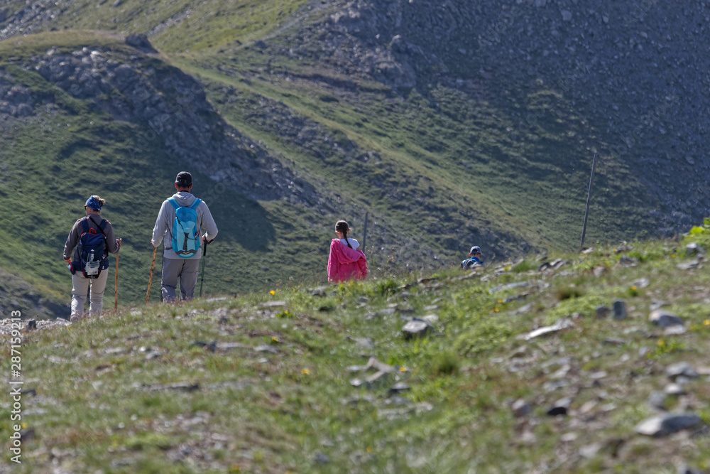 CHAMROUSSE, FRANCE, July 17, 2019 : Walk in Chamrousse, a mountain resort of Belledonne range near Grenoble. Chamrousse hosted the six alpine skiing events of the 1968 Winter Olympics