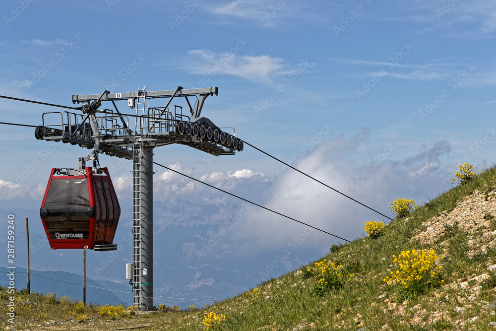 CHAMROUSSE, FRANCE, July 17, 2019 : Cable car in Chamrousse, a ski resort of Belledonne mountain range near Grenoble. Chamrousse hosted the six alpine skiing events of the 1968 Winter Olympics