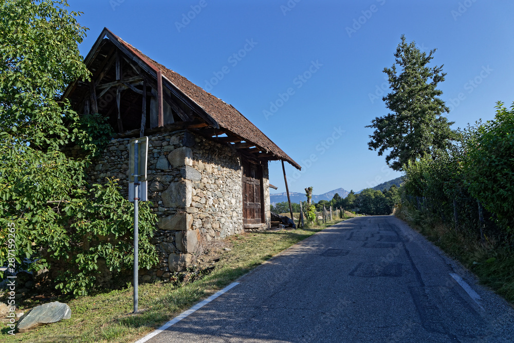 CHAMROUSSE, FRANCE, July 19, 2019 : Countryside road in Belledonne range near Grenoble.