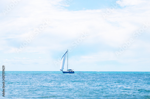 Sailing. Yachting. Tourism. Ship yachts with white sails in the open sea.