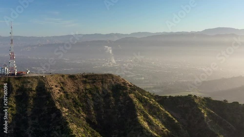 Aerial: Mount Lee at Sunset with View over North Los Angeles  - Hollywood, California