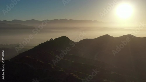 Aerial Pan: Santa Monica Mountains At Sunset Through Thick Haze - Hollywood, California