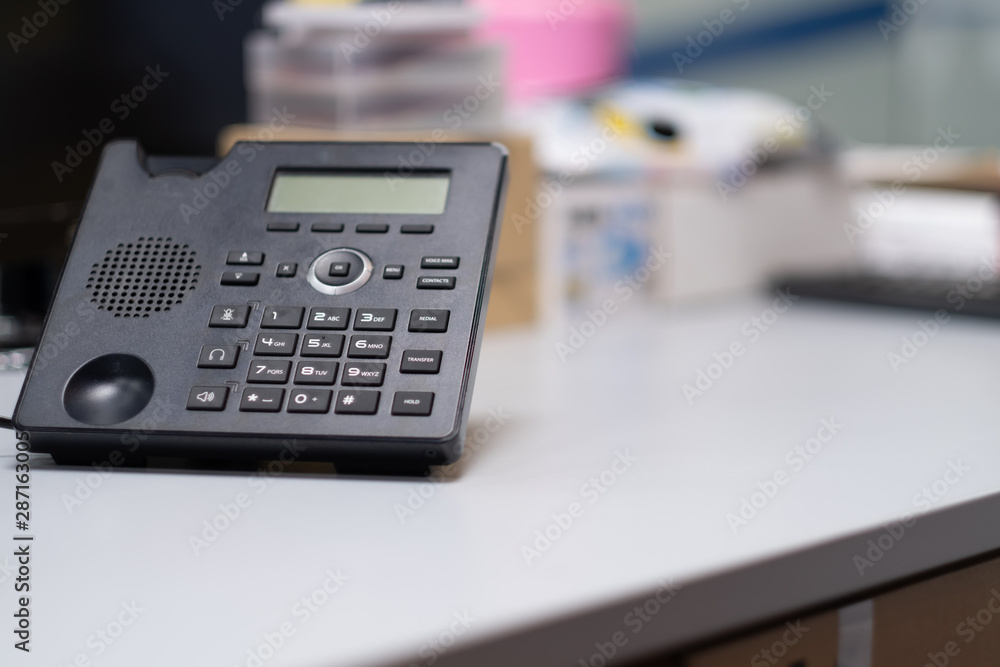 Selective focus Analog telephone black color put on desk office Selective focus Analog telephone black color put on desk office