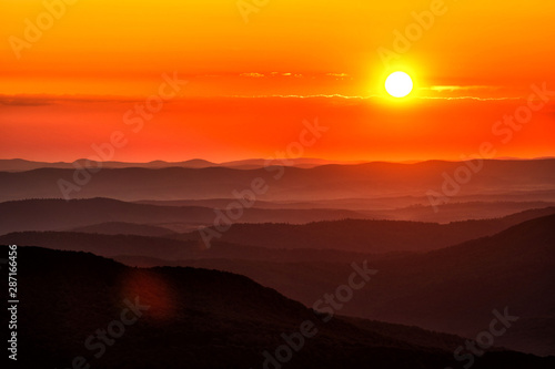 Silhouettes of the mountains at sunrise. Bieszczady National Park. Poland © Szymon Bartosz