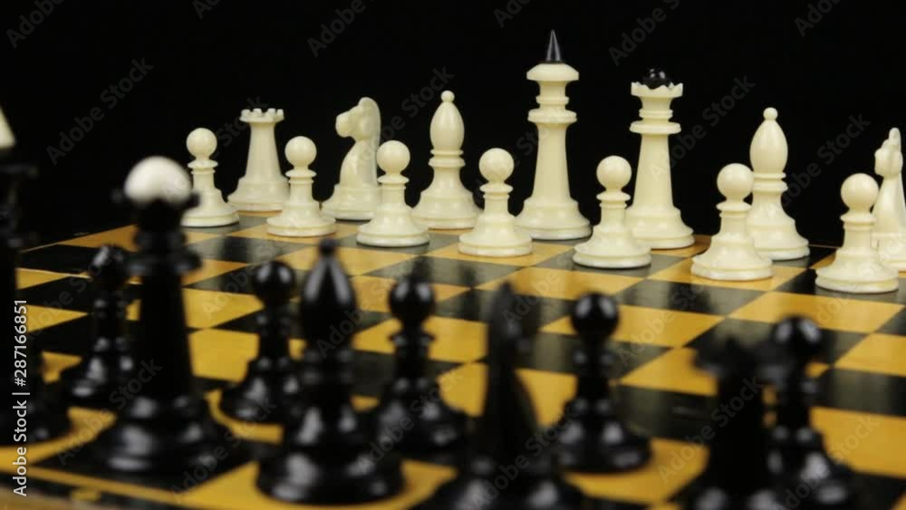 Rotation of the chessboard with the figures arranged for the start of the chess game. Rotation of the chessboard with the figures arranged for the start of the chess game.