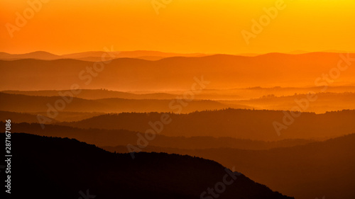 Fototapeta Naklejka Na Ścianę i Meble -  Silhouettes of the mountains at sunrise. Bieszczady National Park. Poland