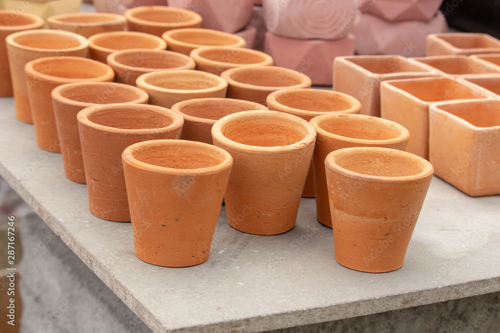 Small clay pots for planting trees. Small clay pots for planting trees.