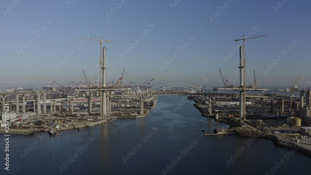 Aerial Forward Through Steel Bridge in Port of Los Angeles Near Cranes and Shipping Containers - San Pedro, California Aerial Forward Through Steel Bridge in Port of Los Angeles Near Cranes and Shipping Containers - San Pedro, California