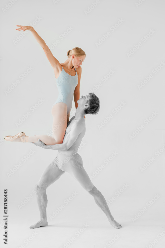 Couple of young and athletic ballet dancers retouched in color and black and white