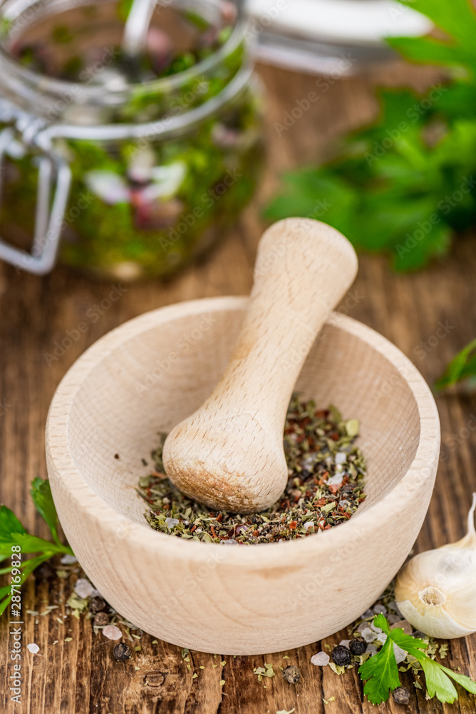 Chimichurri on an old wooden table (selective focus) Chimichurri on an old wooden table (selective focus)