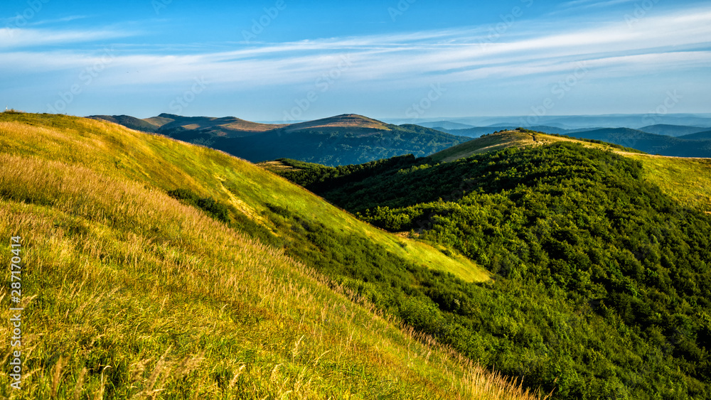 Obraz premium Sunny summer day in the mountains. Photo from Wielka Rawka in the Bieszczady Mountains. Poland.