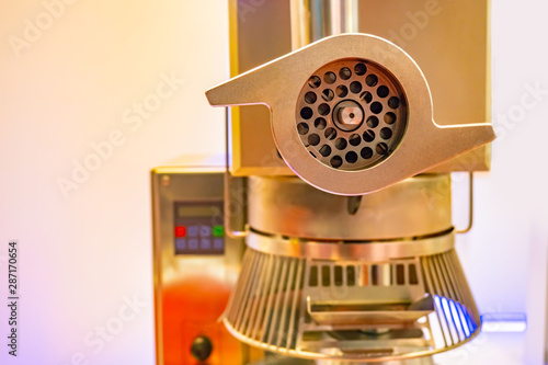 Mincing machine. The meat g...