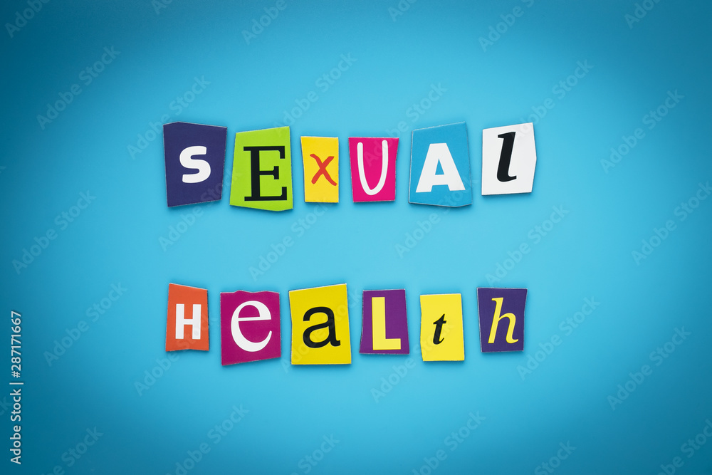 Obraz premium Writing text - sexual health. Colorful letters on a blue background. Heading, message, poster. Self-care concept. Multicolored inscription on banner. Multicolored title.