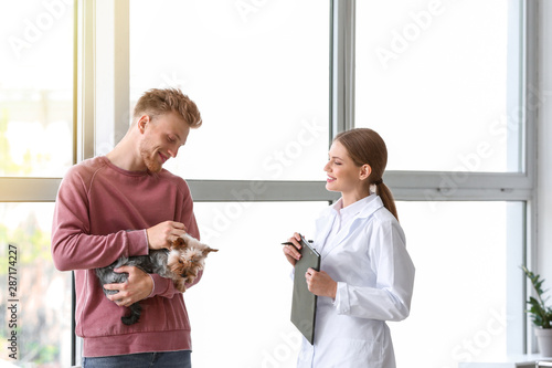 Man with his dog visiting v...