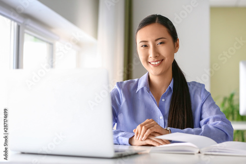 Young Asian student in univ...