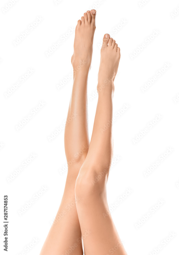 Young woman with slim legs on white background Young woman with slim legs on white background
