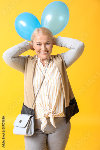 Stylish mature woman with a...