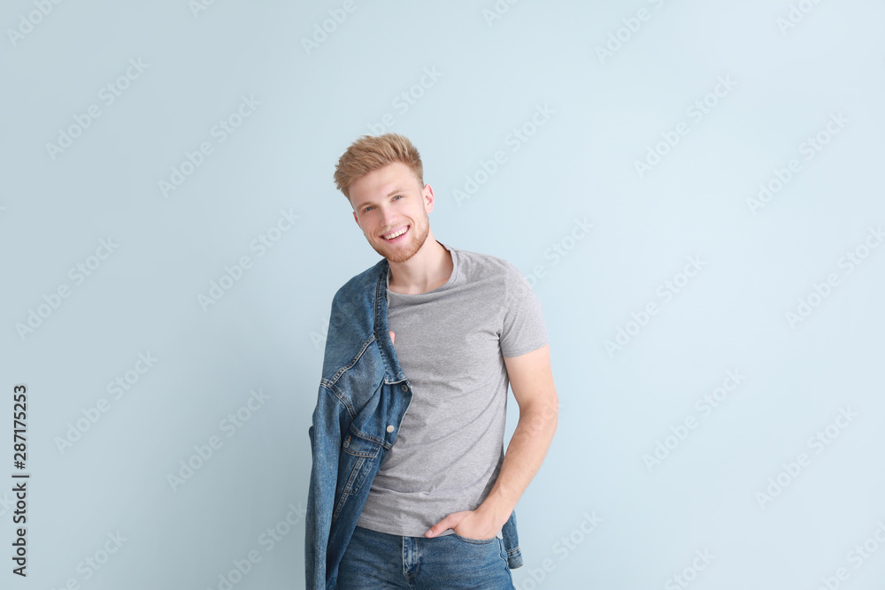 Man in stylish t-shirt on color background Man in stylish t-shirt on color background