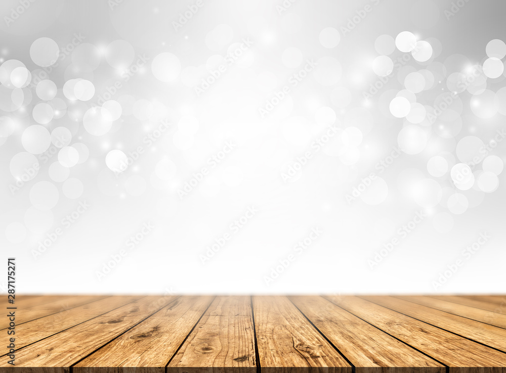 Empty wood table top on white bokeh abstract background . For to place your workpiece or product. Christmas and New Year concepts Empty wood table top on white bokeh abstract background . For to place your workpiece or product. Christmas and New Year concepts