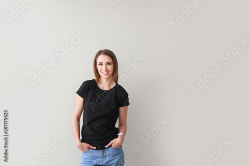 Woman in stylish t-shirt on...