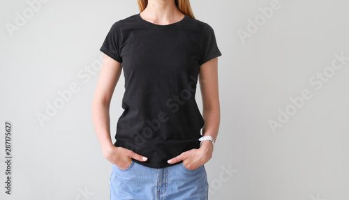 Woman in stylish t-shirt on...