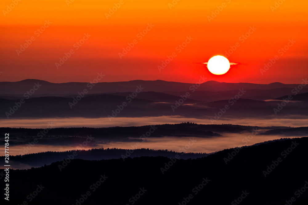 Beautiful misty sunrise in the mountains. Bieszczady Mountains. Poland. Beautiful misty sunrise in the mountains. Bieszczady Mountains. Poland.
