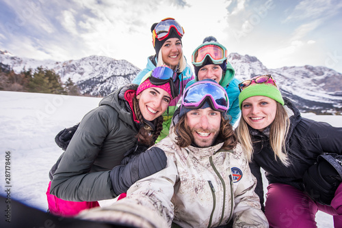 Group of snowboarders on winter holiday