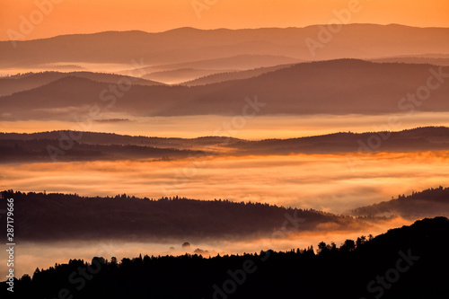 Fototapeta Naklejka Na Ścianę i Meble -  Beautiful misty sunrise in the mountains. Bieszczady Mountains. Poland.