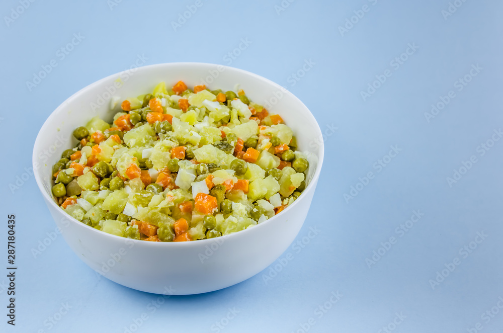 Russian salad Olivier with potato carrot green peas Russian salad Olivier with potato carrot green peas