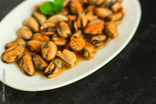 mussels (delicious seafood) portion serving. top food background. copy space