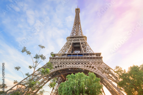 Beautiful landscape Eiffel tower in summer Paris, France under the sunset sky, Eiffel Tower the most romantic tourist attraction and the symbol of Paris.