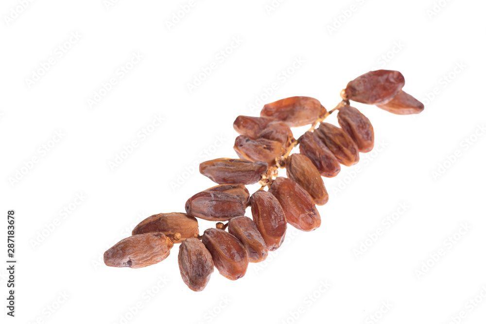 Obraz premium bunch of date fruits with palm leaf isolated on white background
