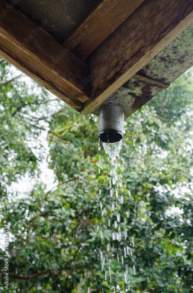 Rain Pouring Down from The Gutter. Rain Pouring Down from The Gutter.