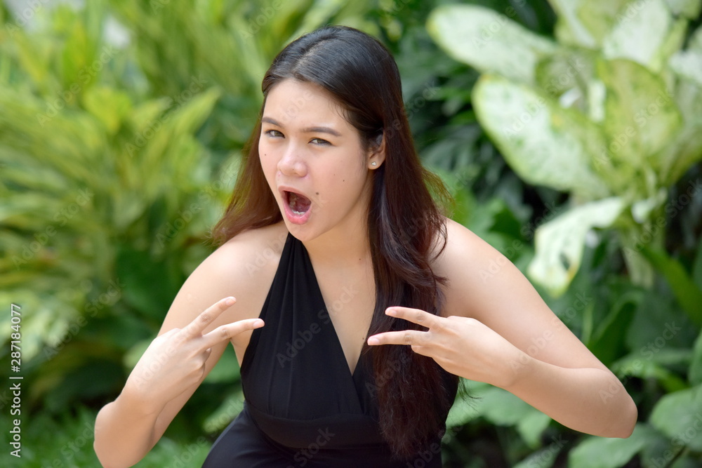 A Pretty Asian Woman Having Fun