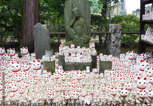 Photography Traditional beckoning cats in Gotoku-ji temple in Tokyo