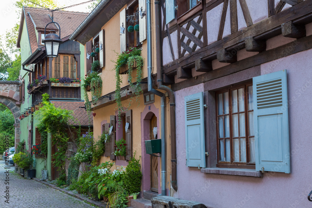 Beautiful colorful street of medieval village Kaysersberg. Alsace. France. Beautiful colorful street of medieval village Kaysersberg. Alsace. France.