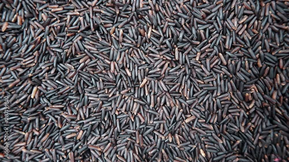 Black rice as natural food background. Top view. Healthy diet gluten free Black rice as natural food background. Top view. Healthy diet gluten free