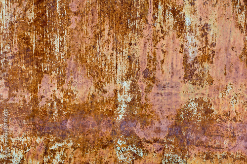 Rust, rusty background, rusty metal texture with paint residue and scratches