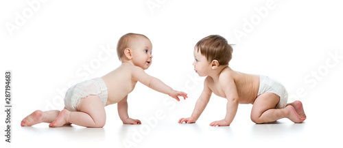 Two cute children looking a...