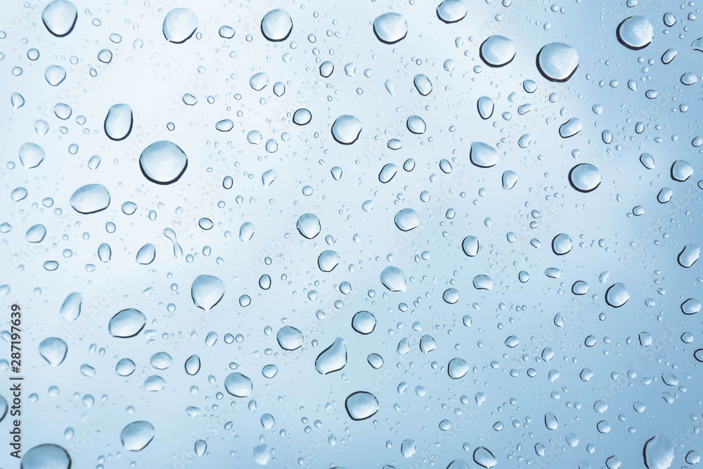 Blue Drops water drops on glass surface as background. Blue Drops water drops on glass surface as background.