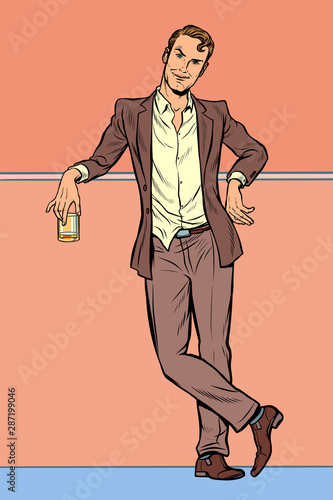 Dandy man with a glass of alcohol
