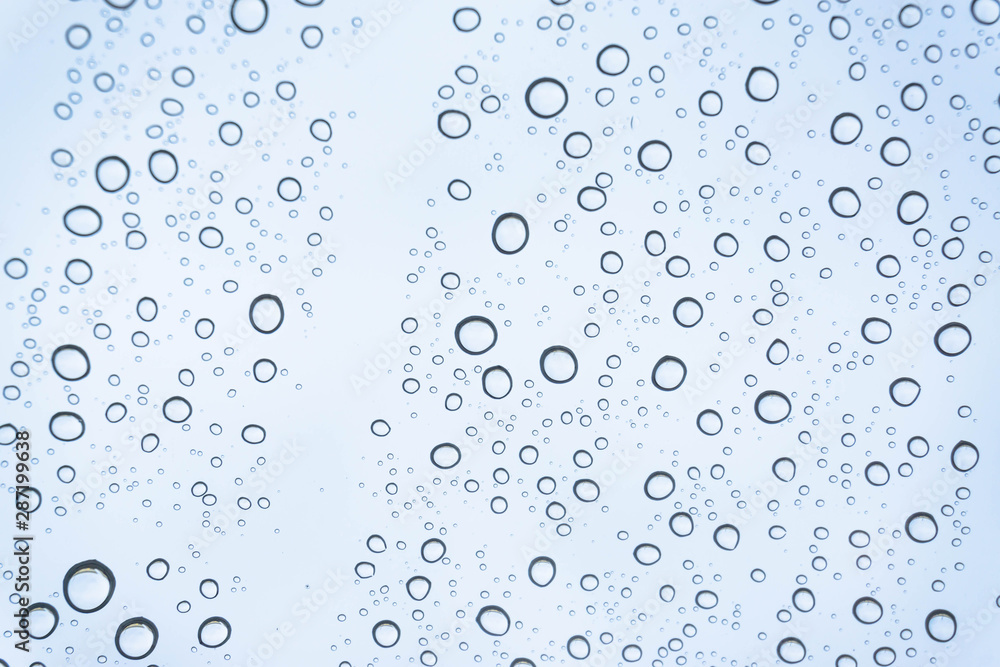 Blue Drops water drops on glass surface as background. Blue Drops water drops on glass surface as background.