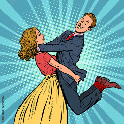 meeting lovers. man and woman hugs. girl carries a guy