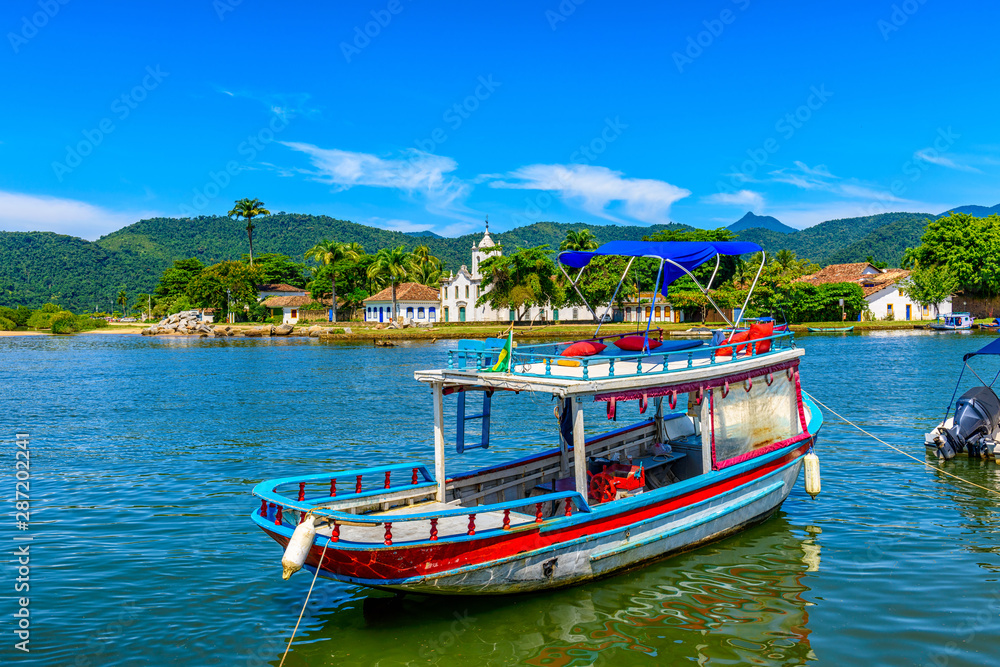 Historical center of Paraty with boat, Rio de Janeiro, Brazil. Paraty is a preserved Portuguese colonial and Brazilian Imperial municipality